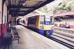 With full size trains and tube stock using the same platforms, they are positioned at a "compromise height", meaning a step up on an Overground car and a step down to the Overground.
